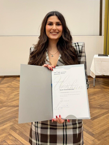 A proud moment: Dr. Christina Okoutsidou receiving the 2025 Dissertation Award