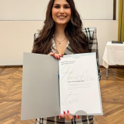 A proud moment: Dr. Christina Okoutsidou receiving the 2025 Dissertation Award